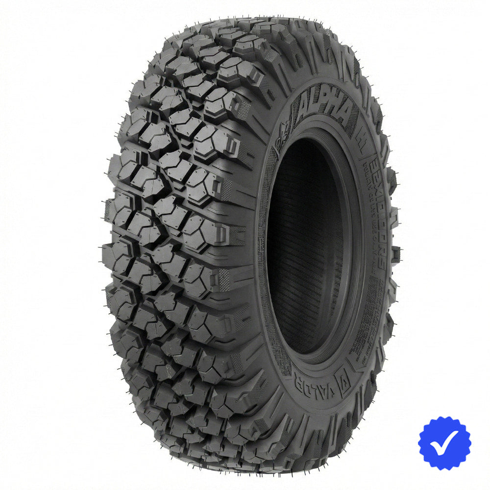 Angled view of the all-new Valor Off Road Alpha 8-Ply Nylon Radial all-terrain SXS and UTV tire, featuring rugged 8-ply construction and smooth riding radial technology, engineered for maximum performance on a wide variety of terrain, Made in the USA, offered with fast and free shipping.