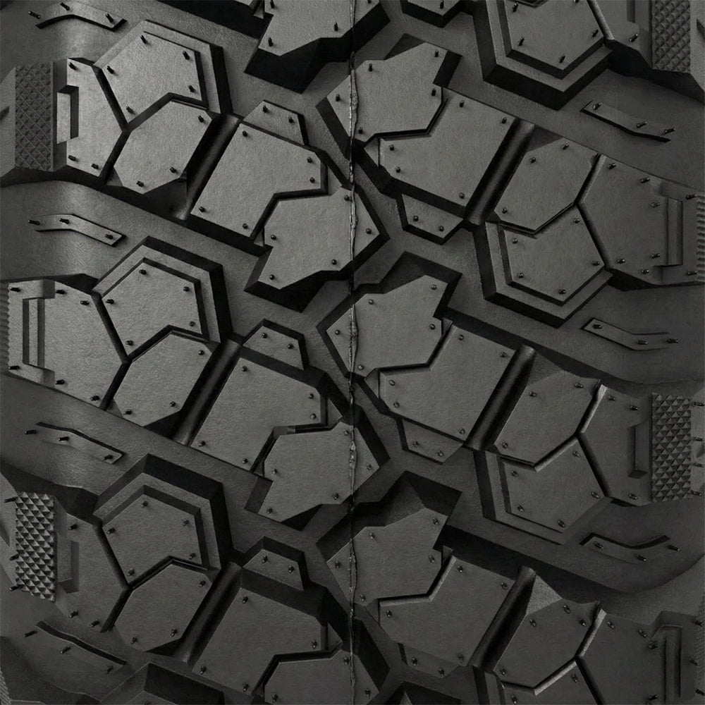 Close up detailed full tread pattern view of the Valor Alpha line of UTV and SXS 8-ply Radial A/T tires, featuring high traction bold lugs with stepped tread block design, siping, and multi-angled surface biting edges.