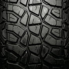 Close up detailed tread pattern view and lug features found on the Valor Tango line of premium UTV tires, showcasing segmented mold construction for ultimate handling, ride, and control, as well as stepped lug bases and staggered shoulder lug design.
