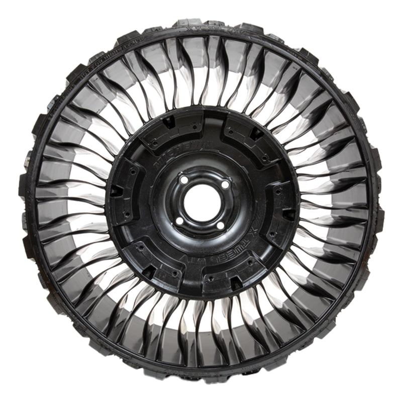 Side profile view of the Michelin X Tweel airless wheel and tire design for UTV and SXS applications, featuring high strength ribbing and multiple available bolt patterns to fit most UTV models, 26 inch tall overall height and all-terrain tread pattern.